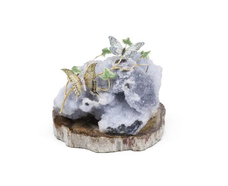A large enamelled and diamond-set crystal ornamentAsprey, circa 1979 The grey crystal specimen mounted on a yellow and mocha 