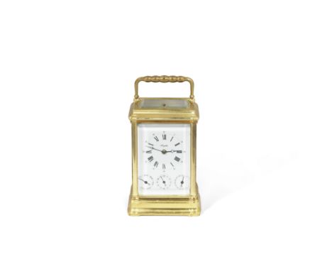 An early 20th century French brass carriage clock with days of the week, calendar and alarm and repeatthe dial signed Angelus