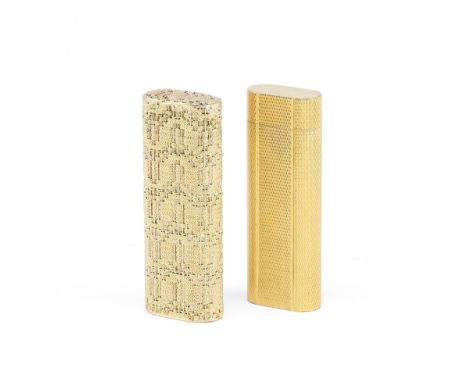 CARTIER: a yellow metal mounted lighterstamped '750' With a textured weaved surface, length 7.1cm; together with a further Ca
