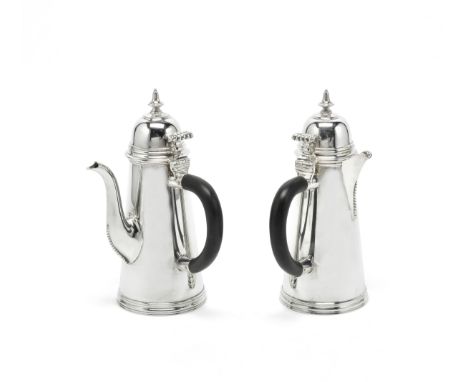 A pair of Scottish silver café au lait potsR &amp; W Sorley, Glasgow 1937In the 18th century style, the hinged domed lids wit