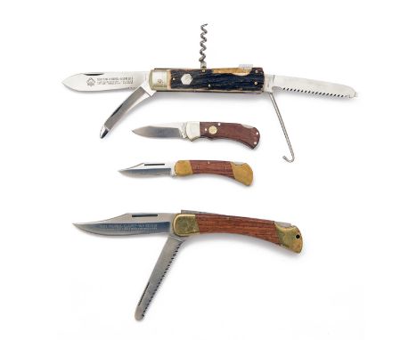 PUMA, SOLINGEN A GROUP OF FOUR FOLDING KNIVES, including a Model 700 lock-knife serial no. 44882 with 2in. drop-point blade, 