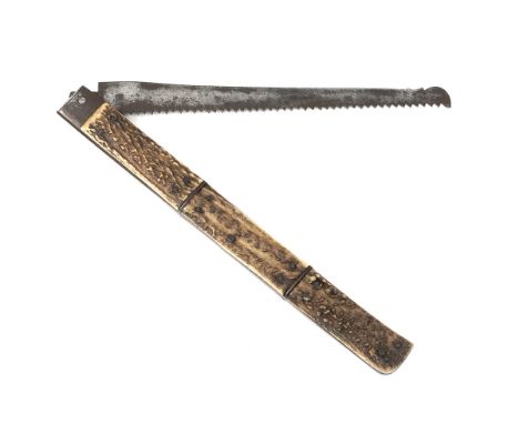 A SCARCE LARGE VICTORIAN FOLDING SAW, UNSIGNED, almost certainly English circa 1870, with 9in. folding blade, decorative pull