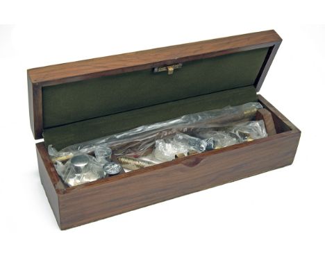 A NEW &amp; UNUSED OAK CASED 'PRESENTATION' GUN CLEANING KIT, comprising of an oil bottle, a pair of 12-bore snap-cap, two-pi