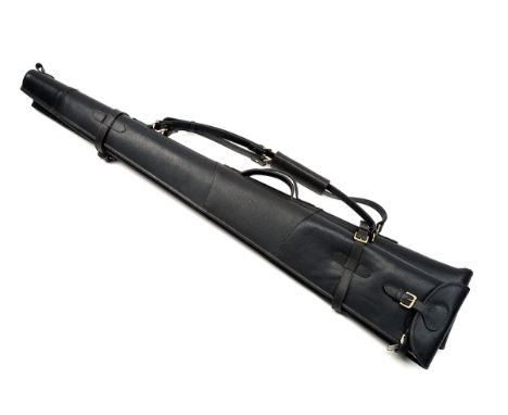 A NEW AND UNUSED LEATHER SHEEPSKIN-LINED DOUBLE GUNSLIP, with leather shoulder strap and brass fittings.  † Please note this 