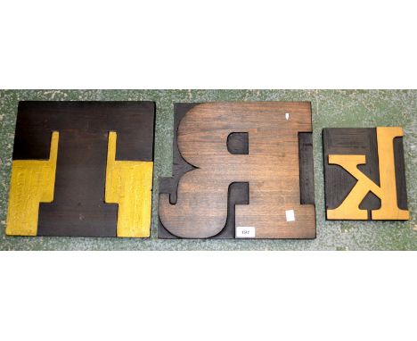 A large wooden printers block of the letter T; others similar,K and R (3)