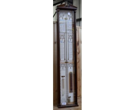 A reproduction mahogany Admiral Fiztroys Barometer 