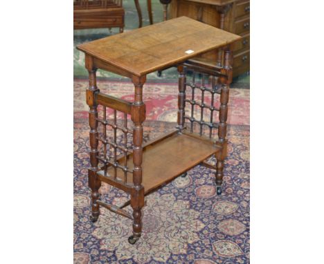 A Victorian oak writing table, turned supports, ceramic casters, c.1890