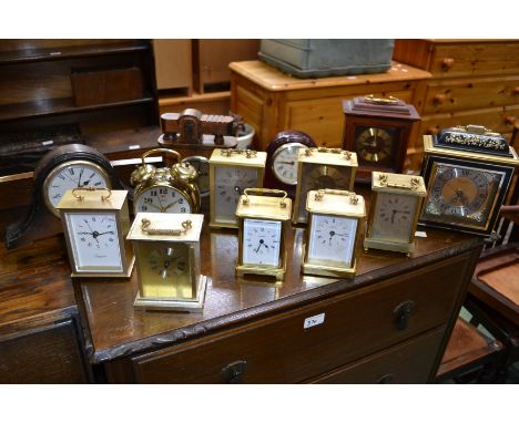 Horology - A Baynard brass carriage clock, made in France; a novelty mantel clock as a table lighter; other quartz clocks; qt