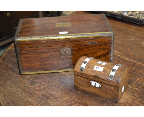 A Victorian mahogany writing box, brass stringing (faults); a Victorian domed rectangular tea caddy (2)