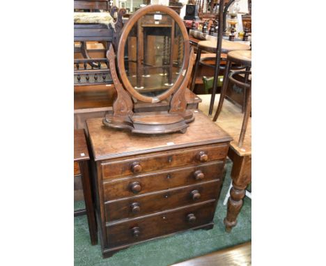 A George III mahogany small chest of drawers, four graduated long drawers, turned handles, bracket feet, c.1815; an early 20t