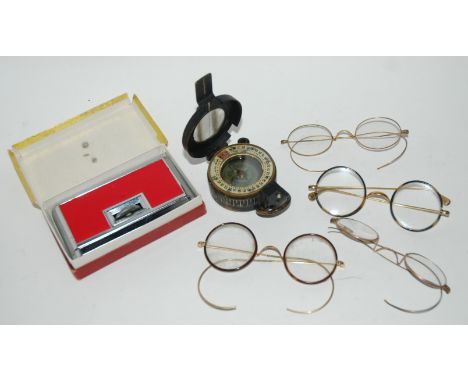A military compass, vintage spectacles and opera glasses Condition Report: Available upon request