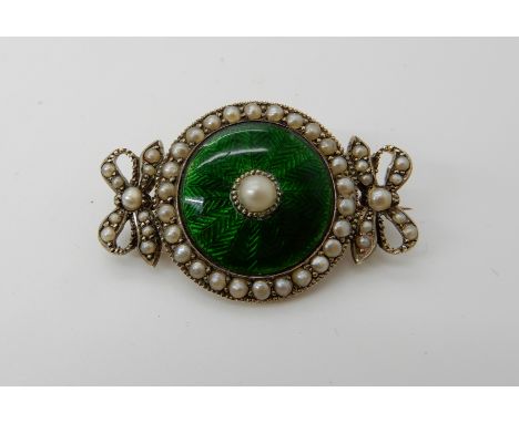 A yellow metal pearl and guilloche enamel brooch, length 3.3cm, weight 6gms Condition Report: enamel; good condition, hand en