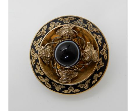 A yellow metal mourning brooch with locket back, black enamel and bulls agate, with applied leaf detail, weight 10.2gms Condi