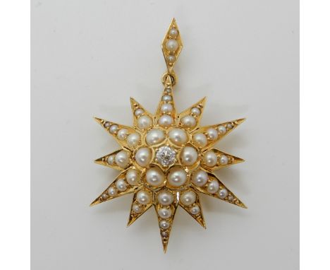A bright yellow metal pearl and diamond Edwardian pendant brooch, diameter 2.6cm, length with bail 4cm, diamond estimated app