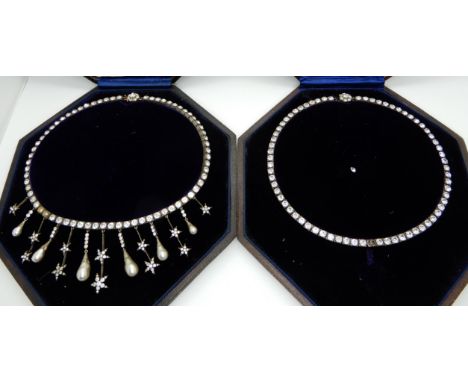 Two vintage costume jewellery diamante necklaces in original fitted boxes, one with a pearl and star theme the other, with a 