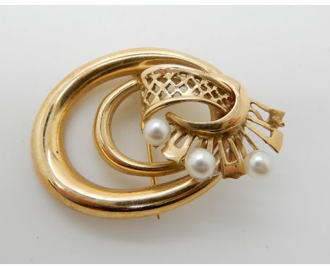 A 14k gold pearl set brooch weight 12.1gms Condition Report: Available upon request