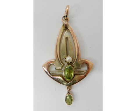 A 9ct gold peridot and pearl Art Nouveau pendant 4.5cm, weight 1.8gms Condition Report: Available upon request