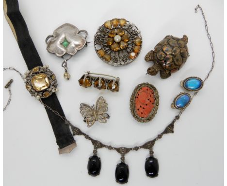 A collection of vintage silver and costume jewellery to include an Arts &amp; Crafts pearl and gem set buckle, a silver, pear