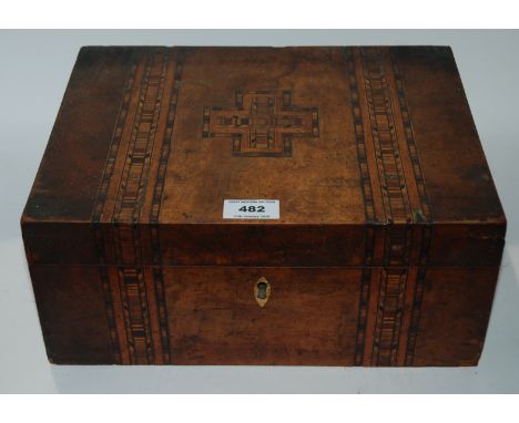 An inlaid sewing box with fitted interior, 33cm wide, crumb tray, bottle stand and ceramic column, 25cm high Condition Report