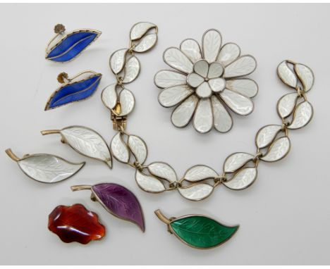 A pair of blue enamel earrings by Ivar Holth, a pair of white enamel earrings by David Andersen a further bracelet and three 