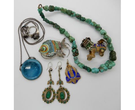 A white metal and enamel fish and fo dog, a Ruskin plaque necklace and a pair of Austro-Hungarian green gem earrings etc Cond