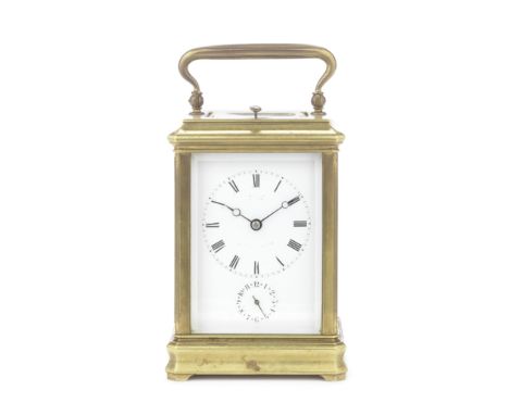 A late 19th century French brass carriage clock with alarm and repeatthe Cannelee case with reeded scrolling handle, the 2.75