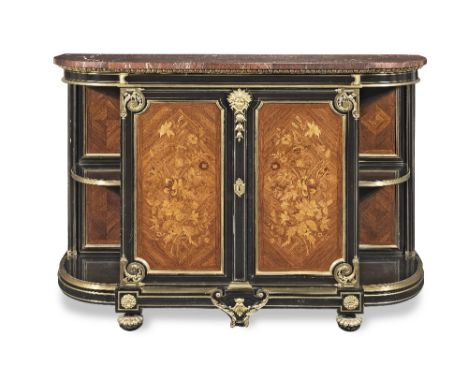 A Napoleon III ormolu mounted ebony, tulipwood, amaranth, sycamore, fruitwood marquetry and brass line-inlaid commode a l'Ang