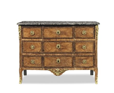 A late Louis XV ormolu mounted tulipwood and amaranth commode by Jacques Birckle (1734-1803)Circa 1770, of slightly breakfron