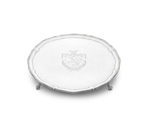 A George III silver salverRobert Makepeace I and Richard Carter, London 1778 Shaped-circular with bead rim, centred with an e