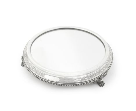 A Victorian silver  mirror plateauHenry Wilkinson &amp; Co, Birmingham 1881 Circular, the raised border with an engraved geom