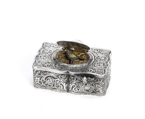 A German silver singing bird box with keyJ D Schleissner and Sohne, Hanau, stamped 930In the manner of Karl Griesbaum, shaped