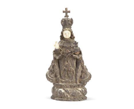 A late 18th/early 19th century Eastern European carved and gessoed wood and bone inset devotional figureprobably a representa