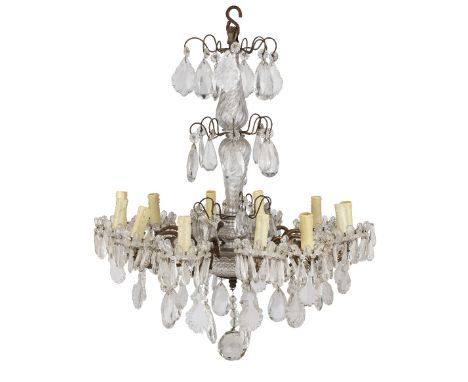 An early 20th century Baccarat cut and moulded glass and gilt brass twelve-light chandelierthe floriate scrolling arms with s