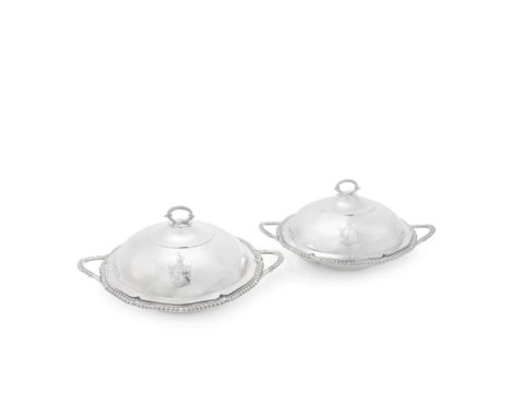 A pair of George III silver vegetable dishes and covers with linersThomas Ellerton &amp; Richard Sibley I, London 1803 Shaped
