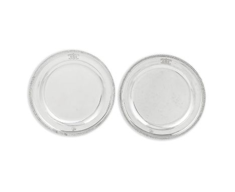 A large pair of George III silver plattersRobert Sharp, London 1799 Circular form with gadroon rim, the raised border with en