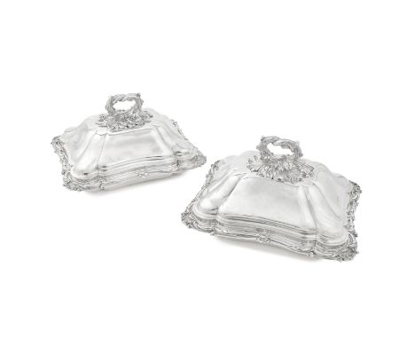 A pair of William IV silver entrée dishes and coversWilliam Kerr Reid, London 1835 Each shaped-oval form, the high shaped-dom