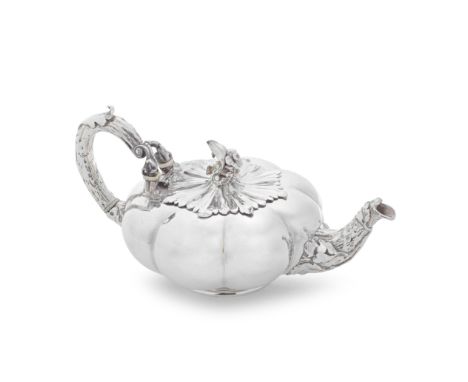 A William IV silver teapotPaul Storr, London 1834Melon form shaped body, with an oak leaf capped and bark effect naturalistic