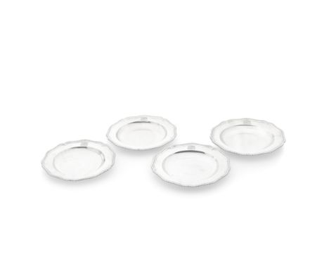 A set of four George III silver soup platesJohn Wakelin &amp; Robert Garrard, London 1801 Each of shaped-circular form with a