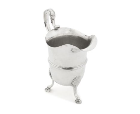 A George III Irish silver cream jugmaker's mark TJ, probably for Thomas Jones, Dublin 1777Helmet shaped with high lip, leaf-c