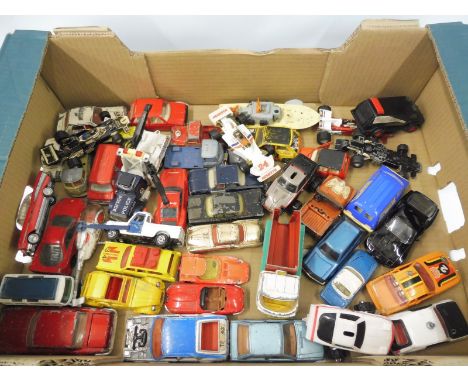 A tray of playworn die-cast models to include Dinky and Corgi.