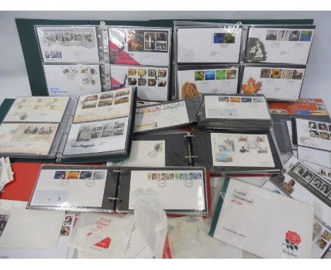 A box of first day cover stamps including first man on the moon. 