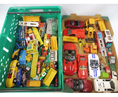 Two trays of playworn die-cast models, various makers and scales.