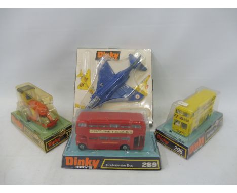 Four circa 1970s boxed Dinky Toys, to include the F4K Phantom, Routemaster bus, the Aveling Roller etc.