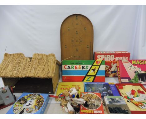 A quantity of assorted board games, bagatelle board etc.