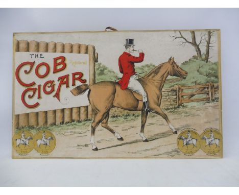 A Cob Cigar pictorial showcard depicting a gentleman on a horse lighting a cigar, 15 x 9".