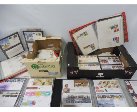 Two boxes of assorted stamps, mostly first day covers, some signed, also The Postmark Club issues. 