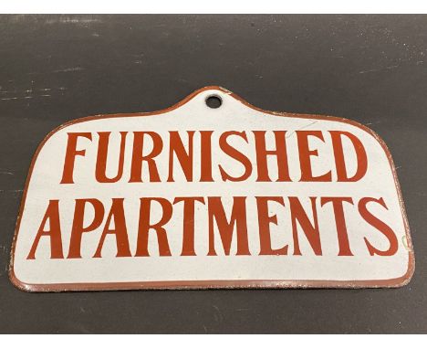 A rare small size enamel sign for 'Furnished Apartments', in very near mint condition, 8 1/4 x 5". 