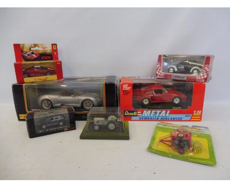 A selection of boxed die-cast models, mixed scales, including Maisto, Revell etc.