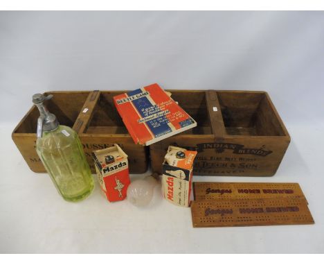 A green glass soda syphon bearing the brand for Maps England, two cribbage boards bearing advertising and two reproduction wo