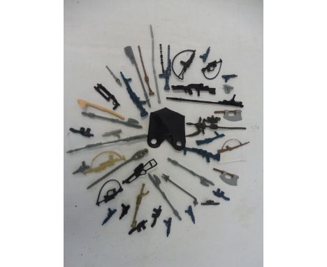 A collection of original Star Wars weapons, blasters, staffs, C3PO's poncho, light sabres etc.